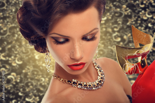 woman wearing masquerade carnival mask.Christmas and New Year