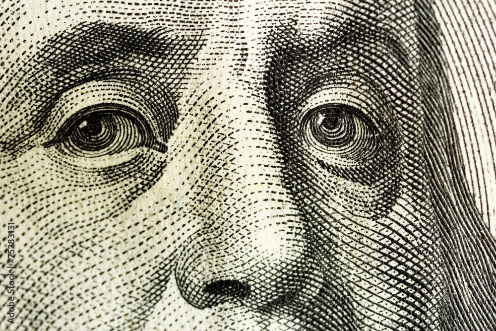 © Africa Studio - Dollar face close-up