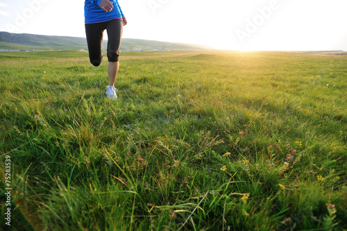young fitness woman runner athlete running outdoor