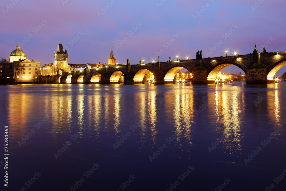 Charles Bridge and Prague Castle Tower lighting at night