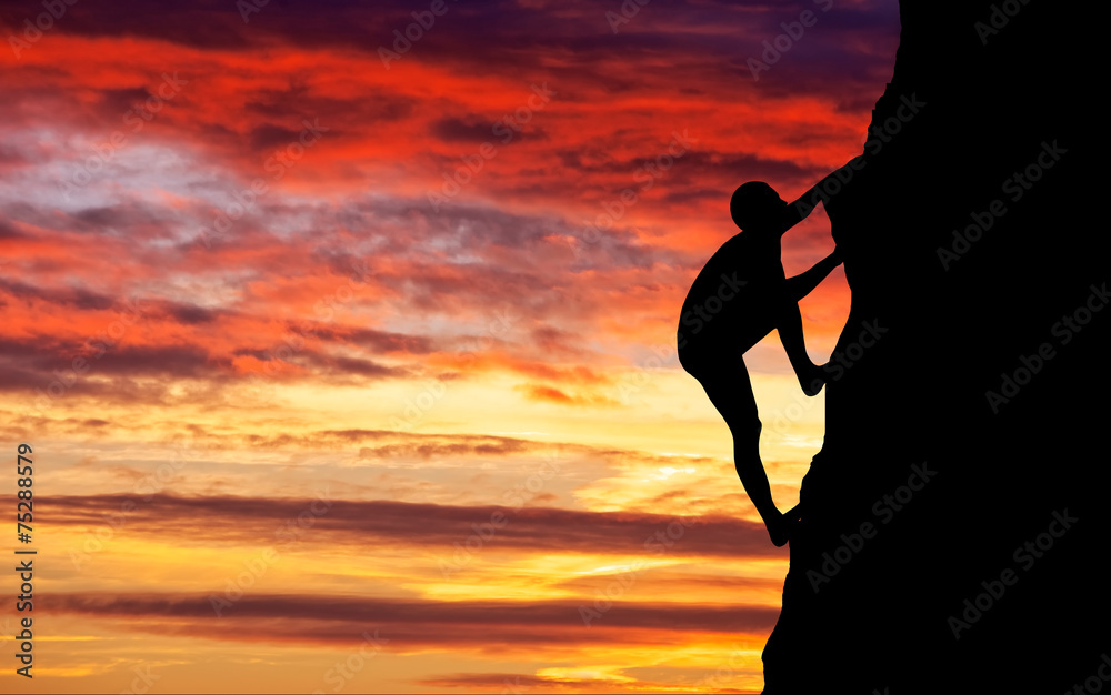 Rock climber at sunset background. Sport and active life Rock climber at sunset background. Sport and active life