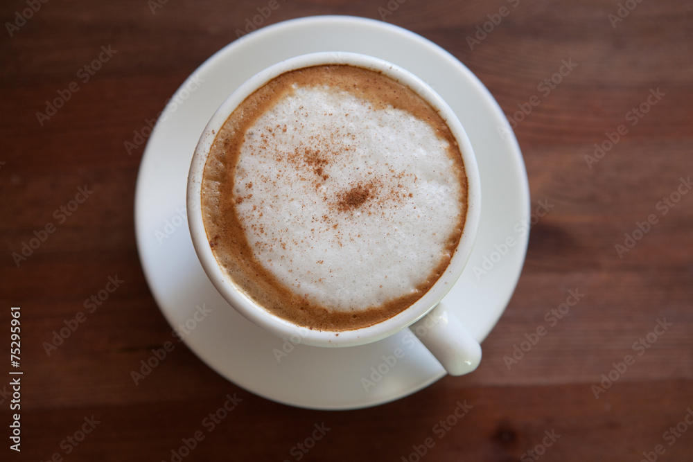 Cappuccino cup with coffee beans Cappuccino cup with coffee beans