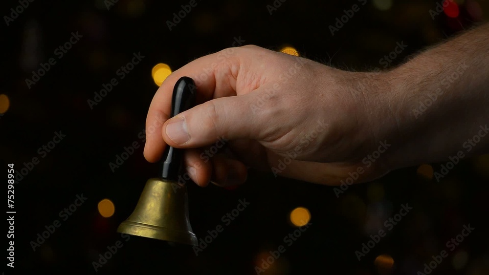 Glocke klingeln vor dunklem Hintergrund