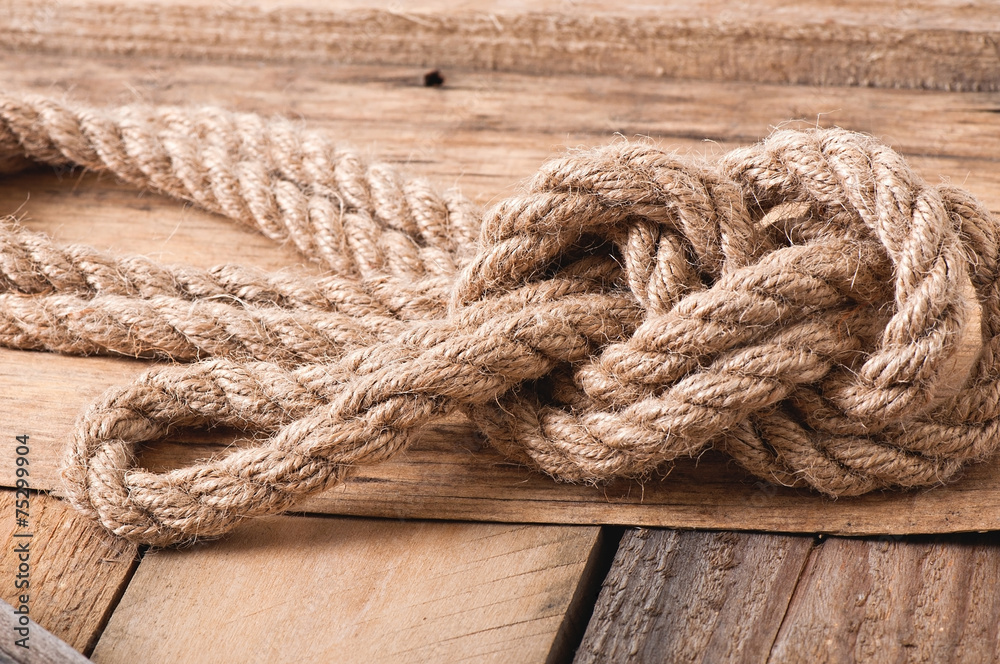 Fototapeta premium knot on a wooden background