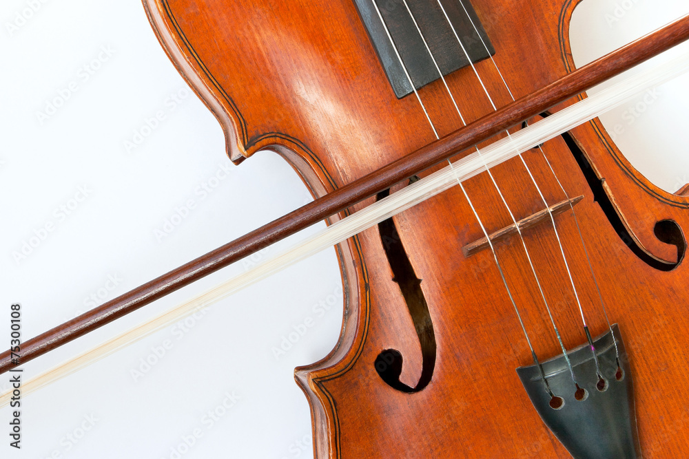 Violin with a bow on a white background Violin with a bow on a white background