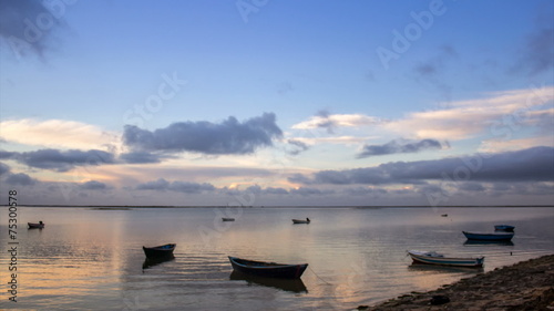 Sunrise timelapse & boat silhouette at Olhão, Algarve.