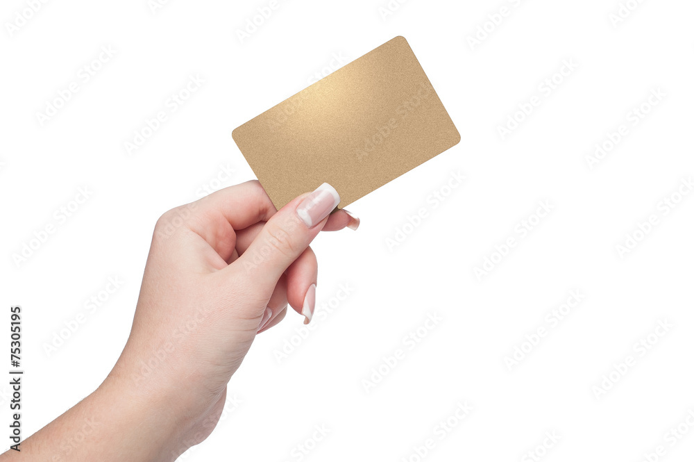 Woman holding gold credit card in hand