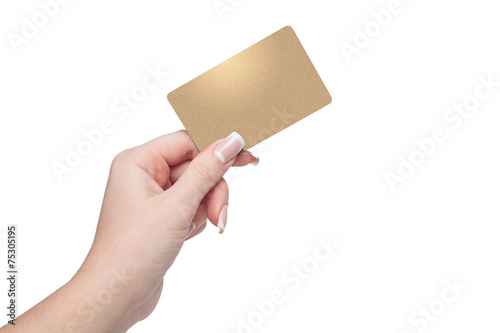 Woman holding gold credit card in hand photo