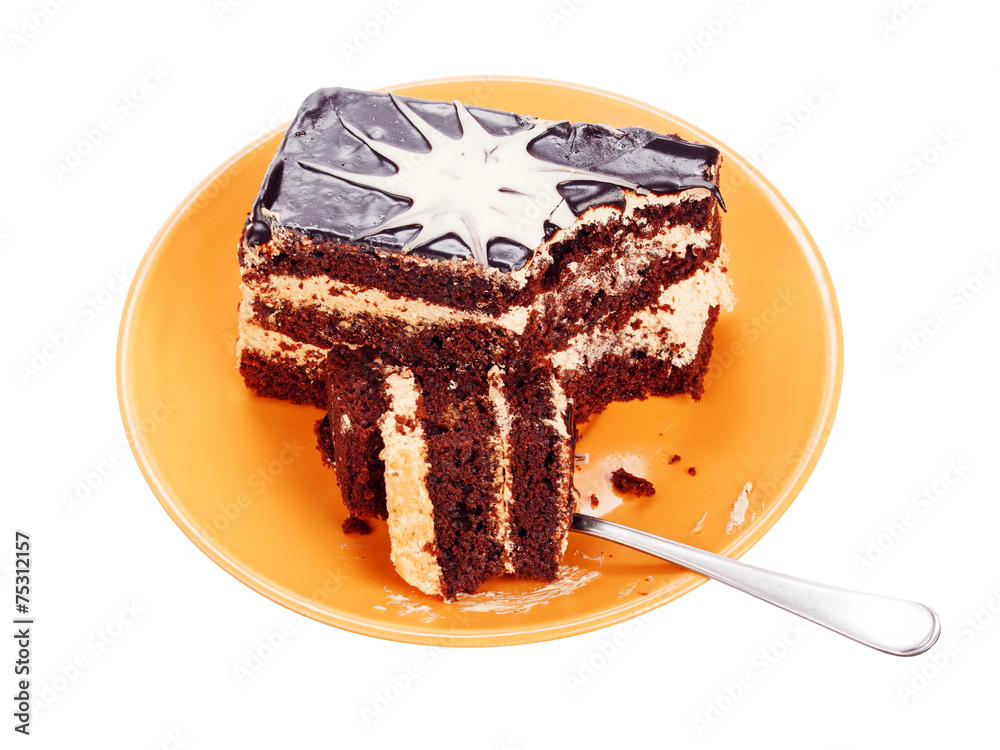 Chocolate cake on orange plate Chocolate cake on orange plate