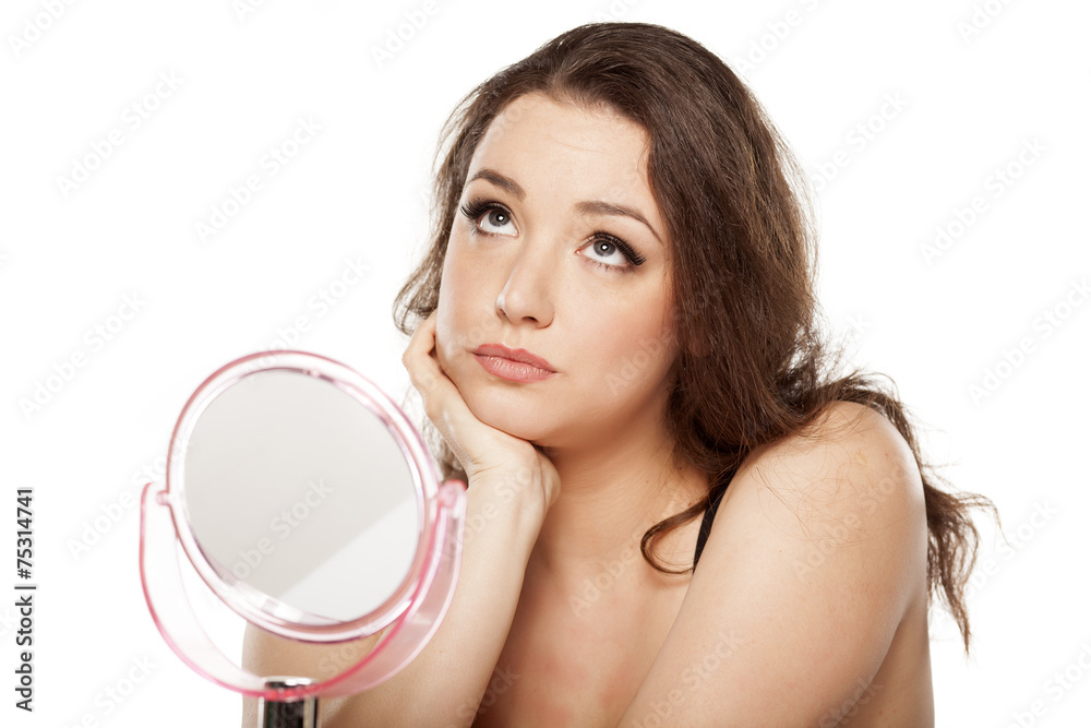 lonely and sad young woman in front of mirror lonely and sad young woman in front of mirror