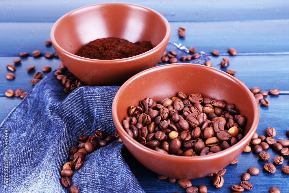Two bowls of ground coffee and coffee beans Two bowls of ground coffee and coffee beans