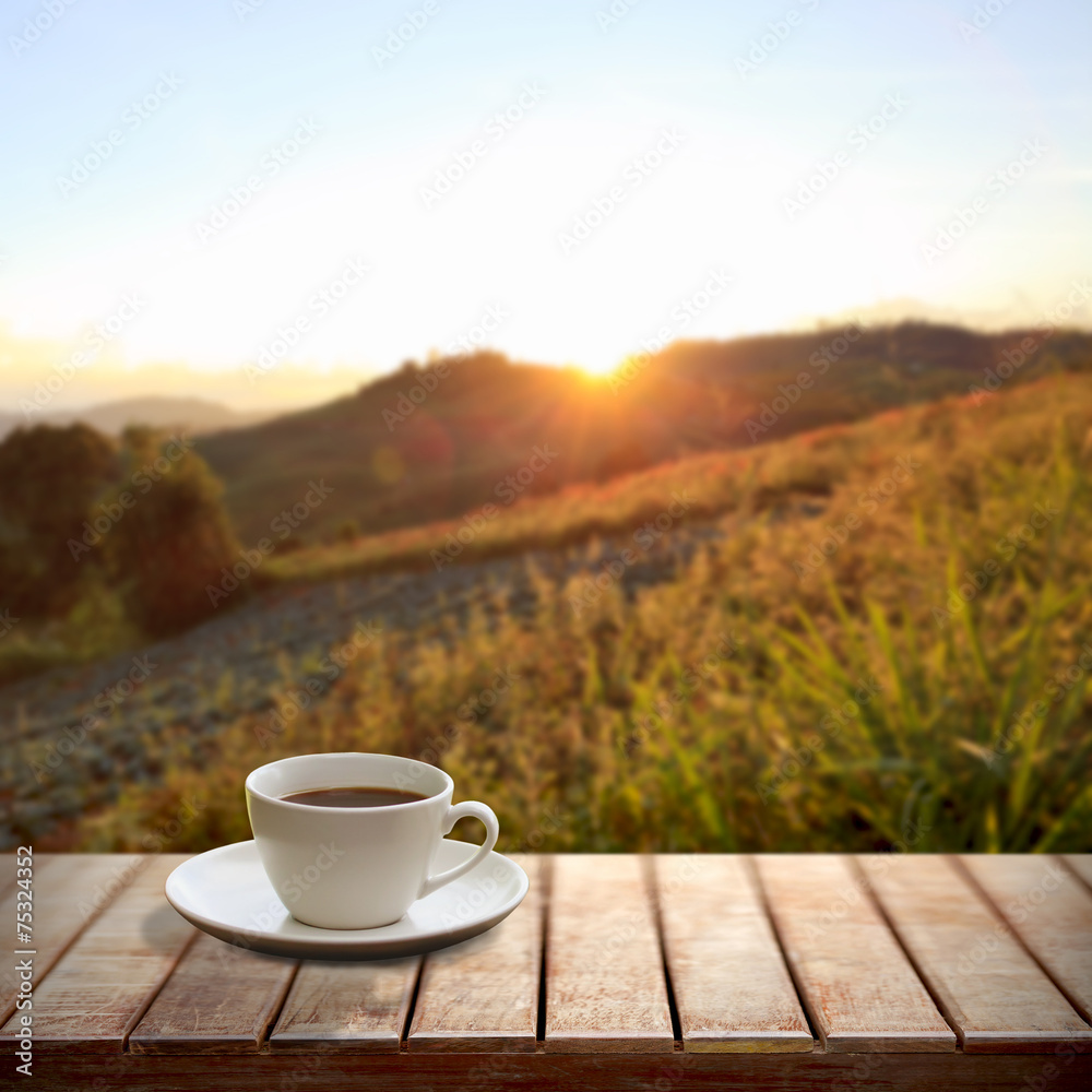 Cup of coffee on a wooden table Cup of coffee on a wooden table