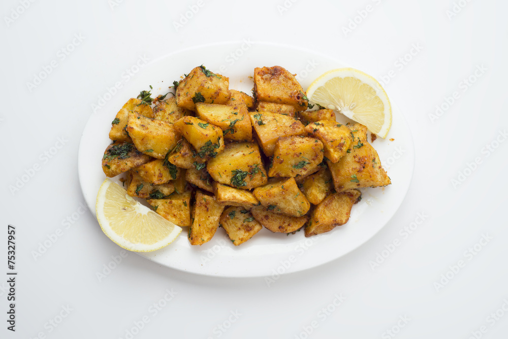 Spicy potato cut in cubes and fried, lebanese cuisine Spicy potato cut in cubes and fried, lebanese cuisine