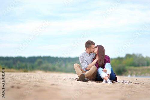 beautiful Couple in love on summer beach © zagorodnaya