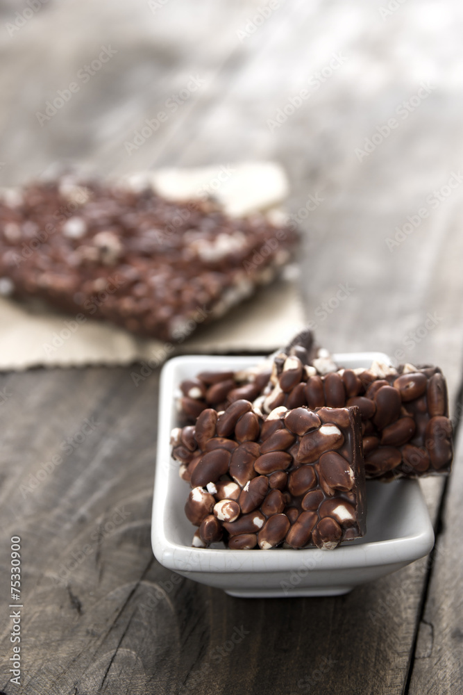 chocolate with puffed rice bar on table chocolate with puffed rice bar on table