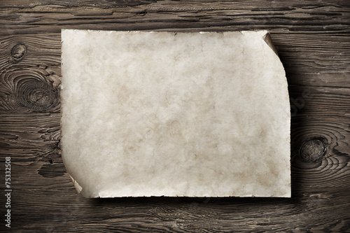 old parchment on aged wood, sepia image