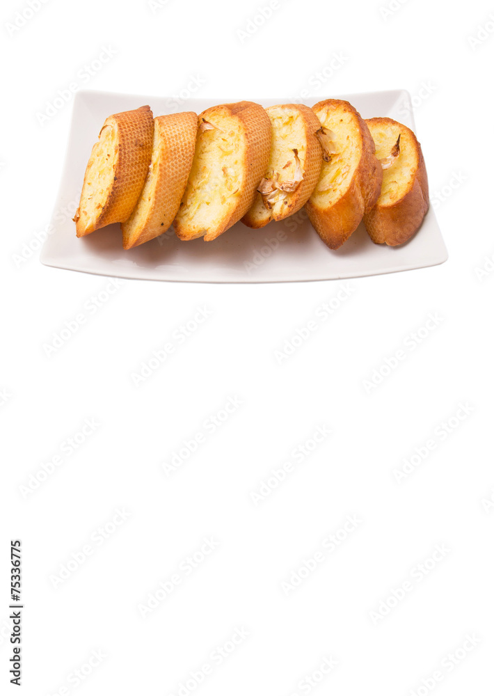 Homemade garlic bread of French baguette slices Homemade garlic bread of French baguette slices