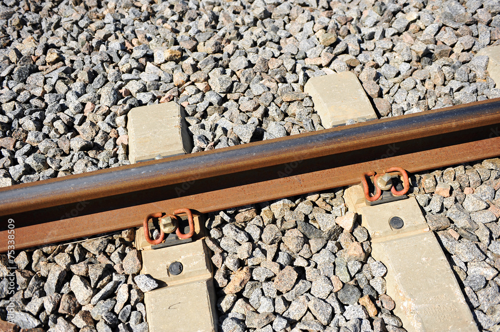 Fototapeta premium Detail of a train rail, railway equipment, rail track