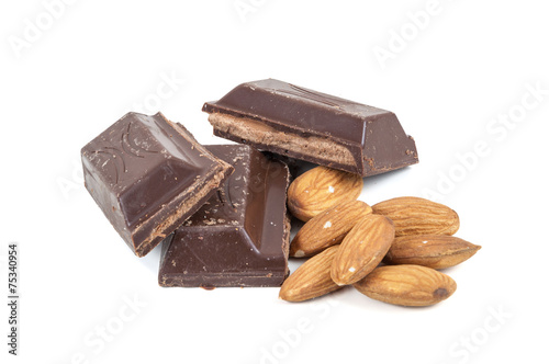 Chocolate pieces and almond on white background