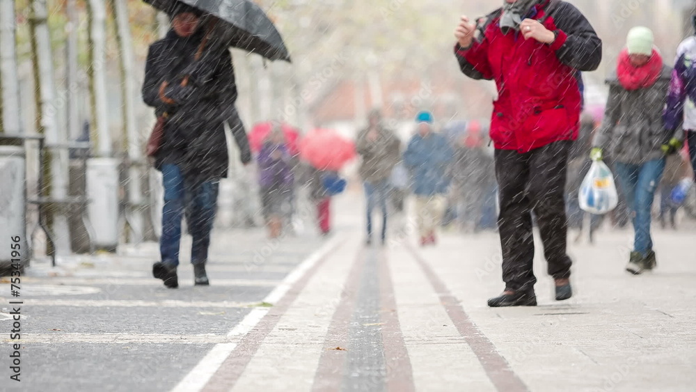 People on pedestrian street on snowy day in Frankfurt