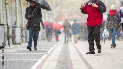 People on pedestrian street on snowy day in Frankfurt