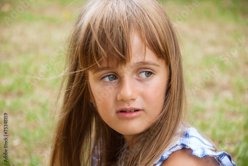 Фотография Portrait of a pensive little girl