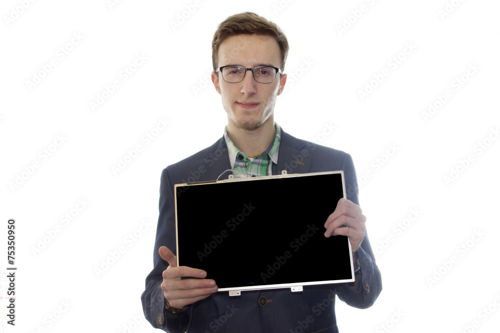 A handsome young entrepreneur holding a display of notebook