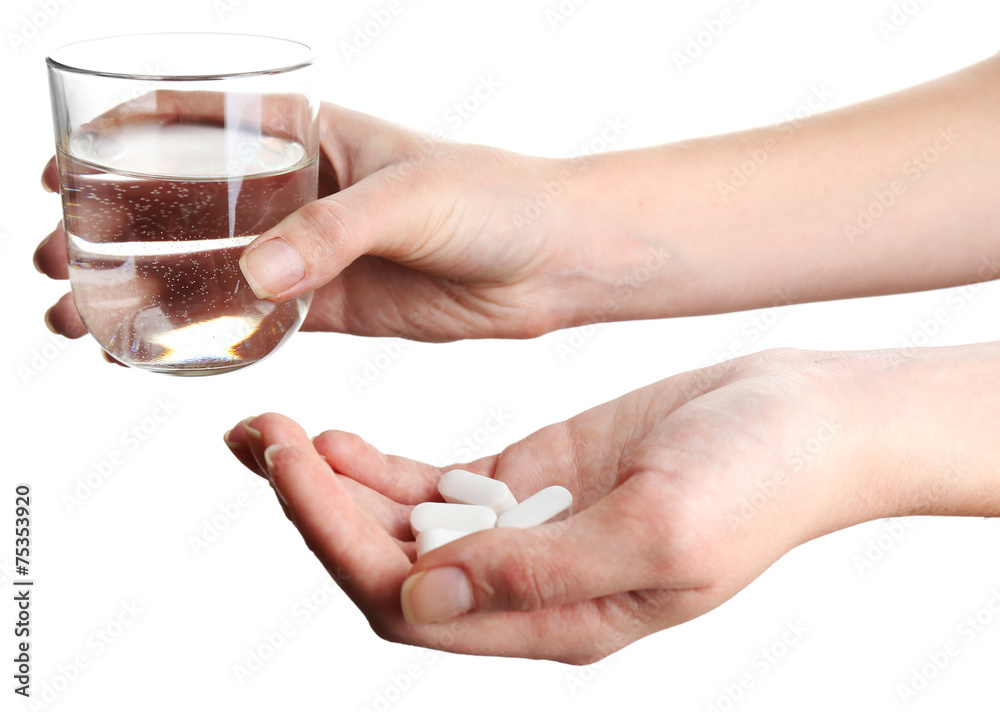 Hands with pills and glass of water isolated on white Hands with pills and glass of water isolated on white
