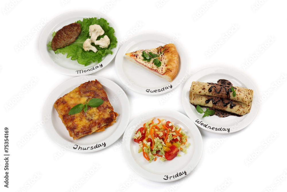 Daily menu. Plates with food on table Daily menu. Plates with food on table
