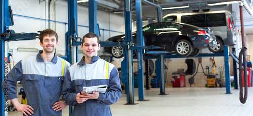 Two man mechanics working