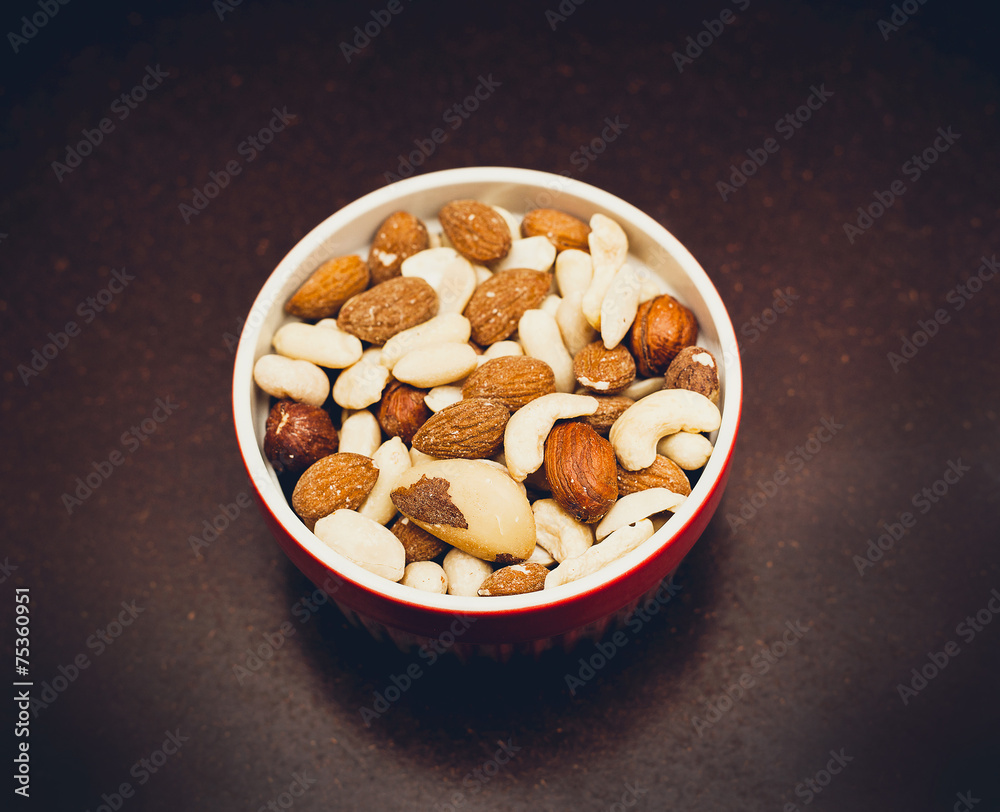 mixed nuts in red bowl mixed nuts in red bowl