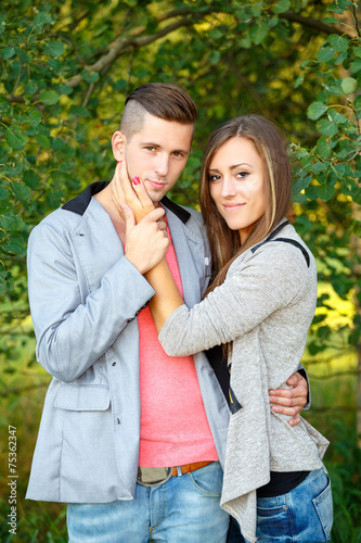 Happy smiling young couple outdoor. valentine concept © ArtushFoto