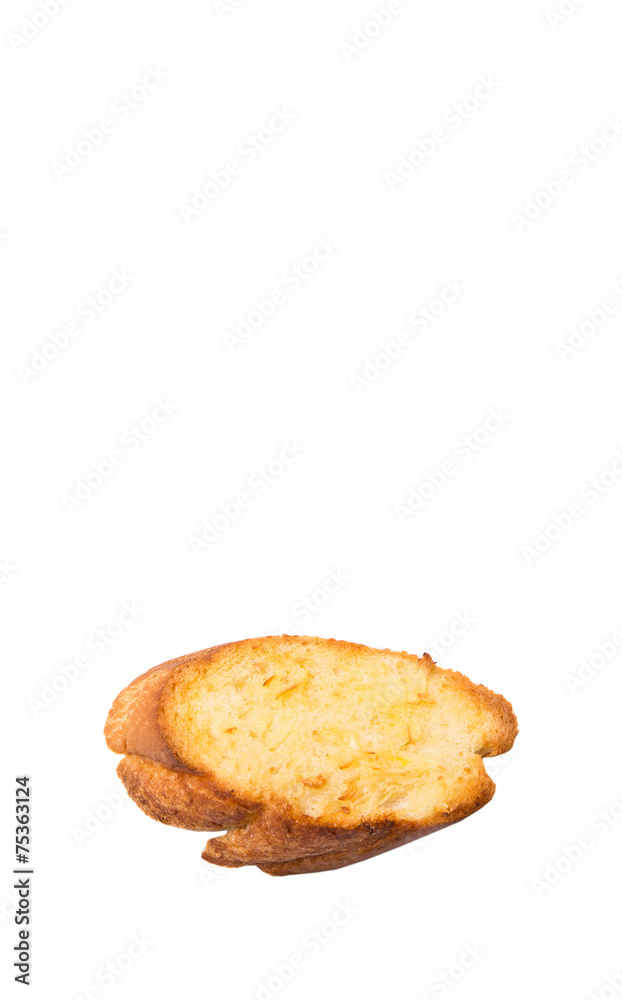 Homemade garlic bread of French baguette over white background Homemade garlic bread of French baguette over white background