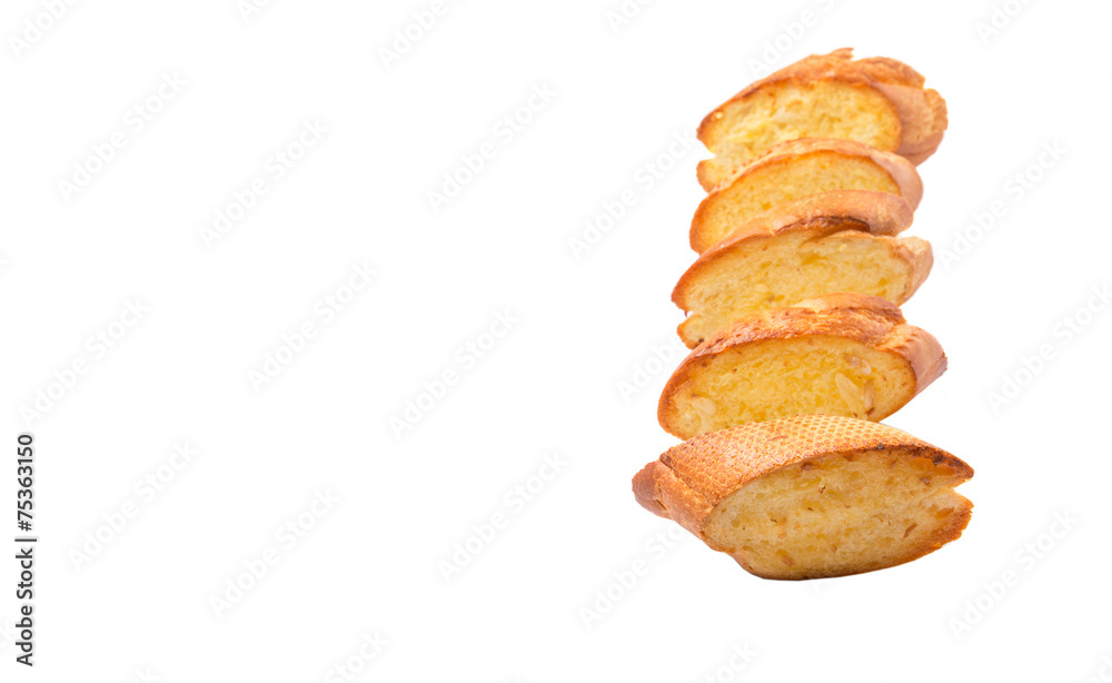 Homemade garlic bread of French baguette over white background Homemade garlic bread of French baguette over white background