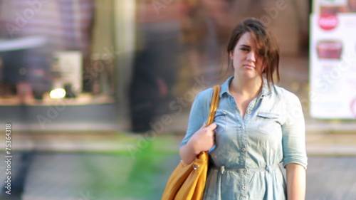 Girl in front of shopping mall