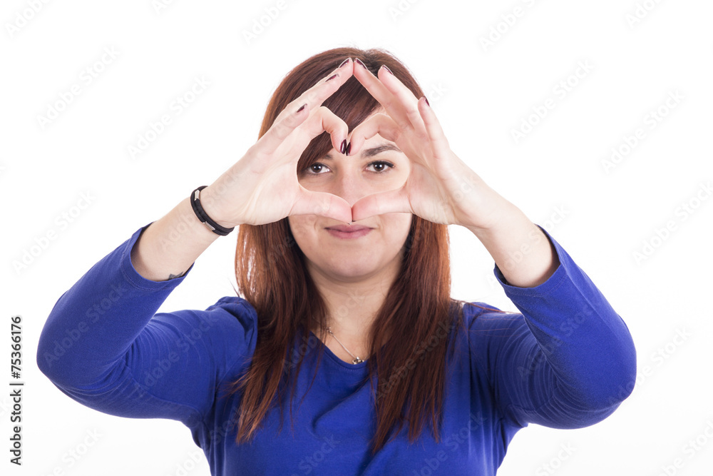 Girl doing heart with her hands Girl doing heart with her hands