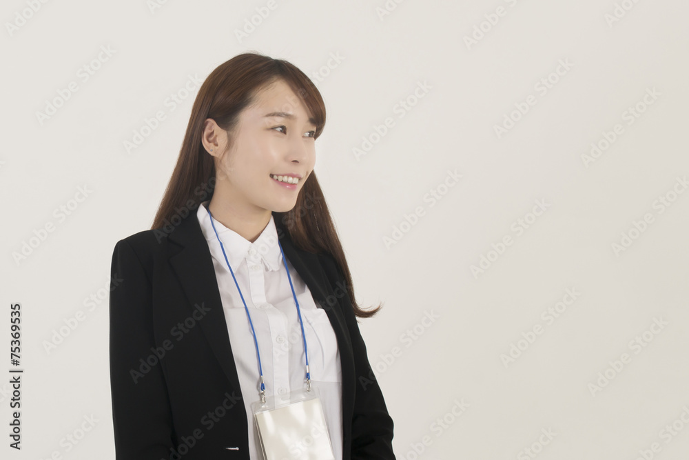 Beautiful young asian businesswoman with id card Beautiful young asian businesswoman with id card