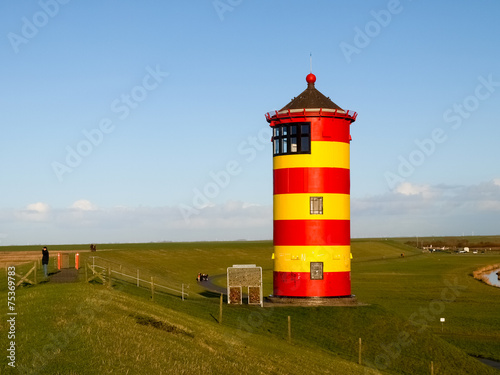 Pilsum  lighthouse at North sea of Germany.