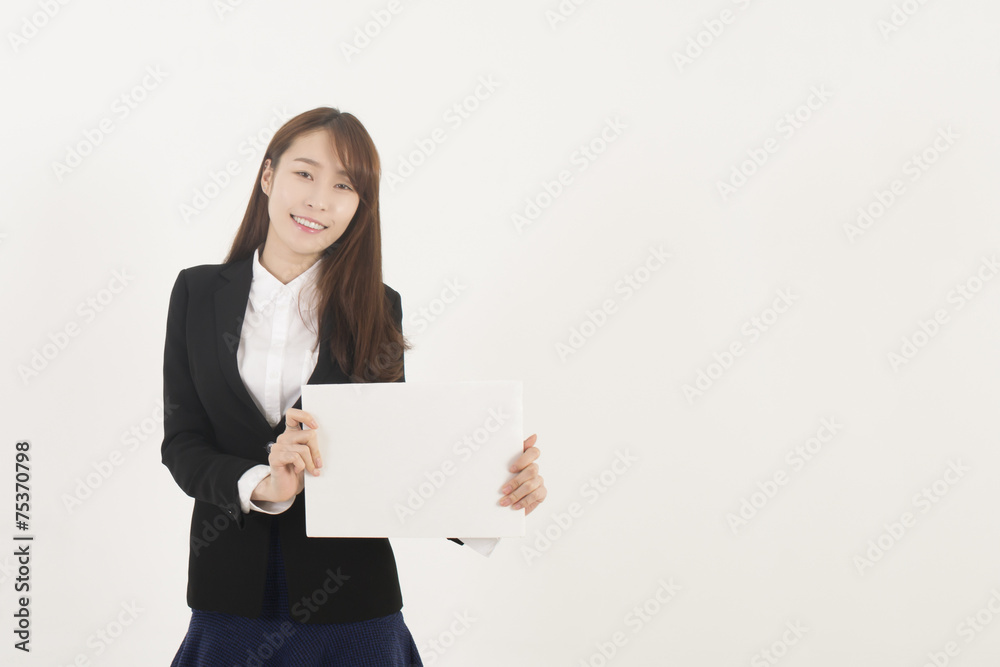 Young Asian Woman Holding a Blank White Sign Young Asian Woman Holding a Blank White Sign