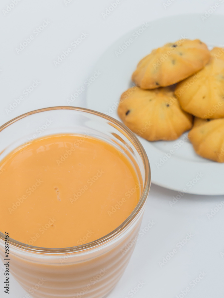 glass of tea milk and cookies glass of tea milk and cookies