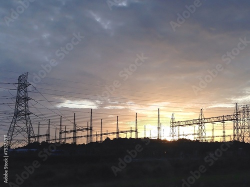 Electric cable over sunset © jack77