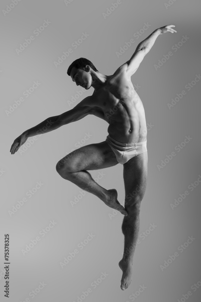 Dance freedom concept. Young handsome ballet man in fly grace po - obrazy, fototapety, plakaty 