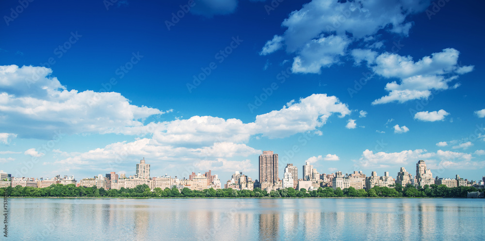 Manhattan buildings over Central Park Lake, New York City