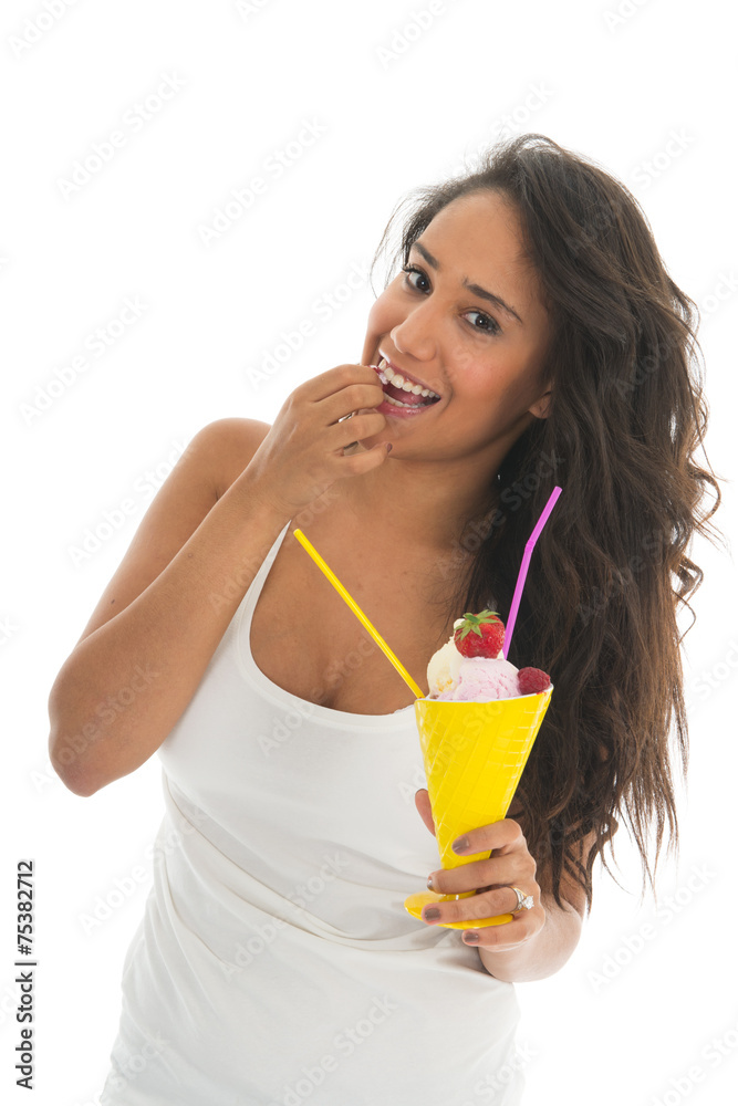 Black woman eating fruit sorbet in glass Black woman eating fruit sorbet in glass