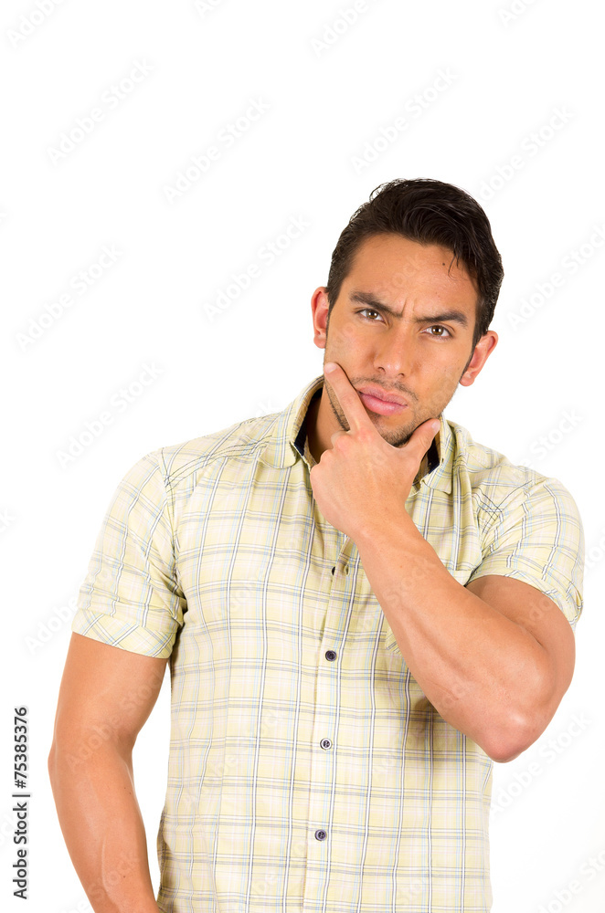 young handsome hispanic man expressing doubt young handsome hispanic man expressing doubt
