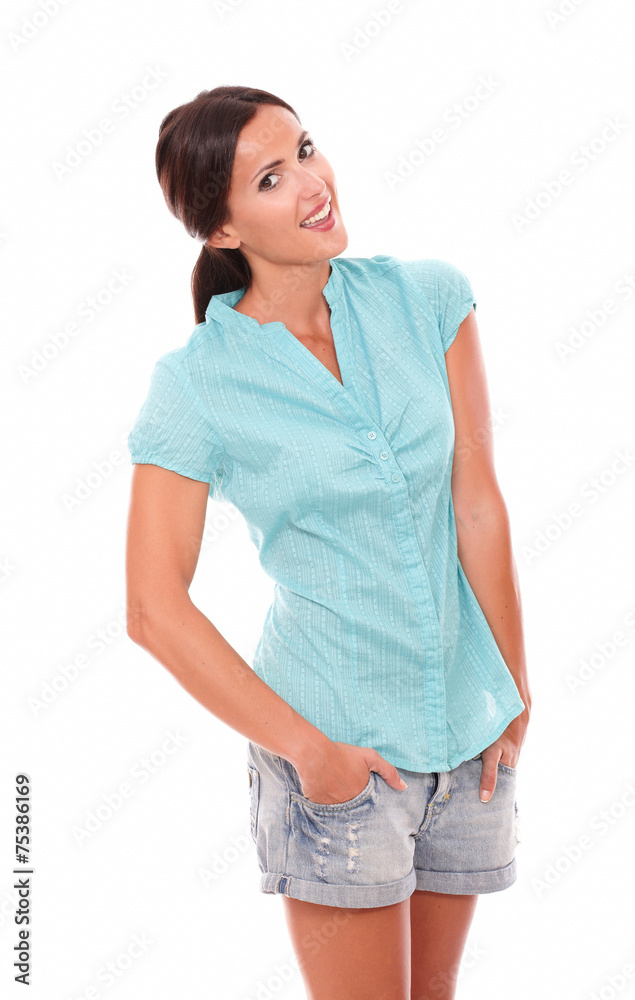 Pretty brunette lady in short jeans looking at you Pretty brunette lady in short jeans looking at you