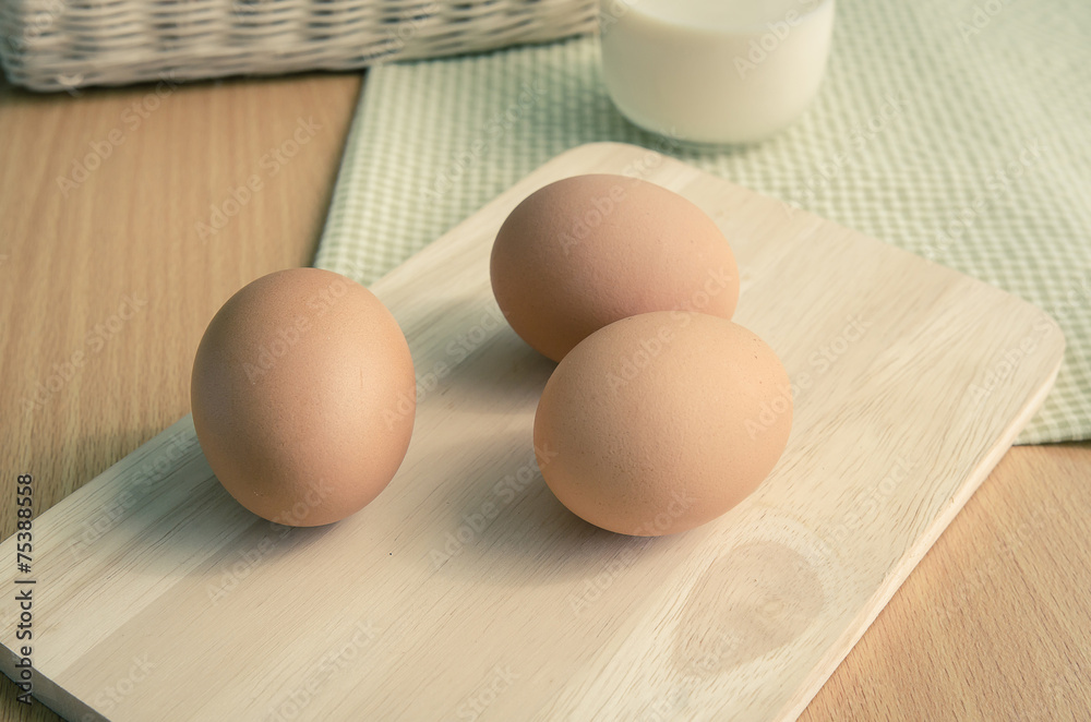 Close up of eggs on wooden table Close up of eggs on wooden table