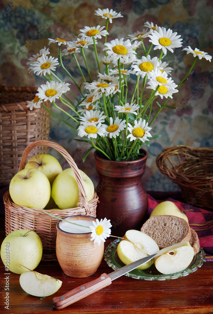 Still life with bouquet of camomile in a vase and fresh apples Still life with bouquet of camomile in a vase and fresh apples