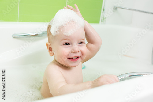 Cute baby  taking a bath