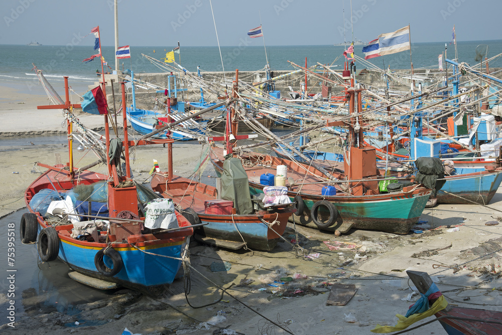 Fishing boats on the beach at Hua Hin Thailand